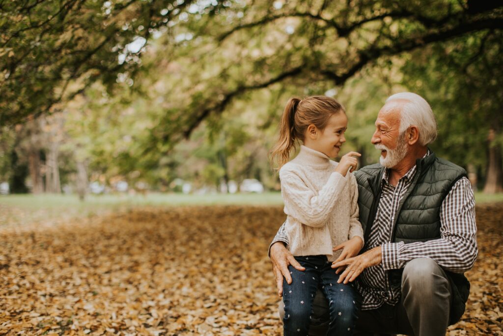 Senior and Grandkid Enjoying Autumn Activities in St. Louis